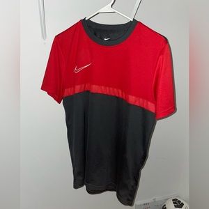 Nike Dri-Fit training shirt. Size: men’s medium.